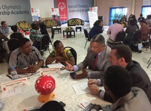 Participants at a 2017 Leadership Academy in Lusaka, Zambia are, from left, Satyagan Choytun, National Director, Special Olympics Mauritius; Mashane Nthutang, Manager, Healthy Athletes, Africa; Hon. Given Lubinda, Minister of Justice, Zambia; Denis Doolan, Chief, Organizational Excellence, Special OIympics International; and Leonard Nkosi, Chairperson, Special Olympics Malawi.